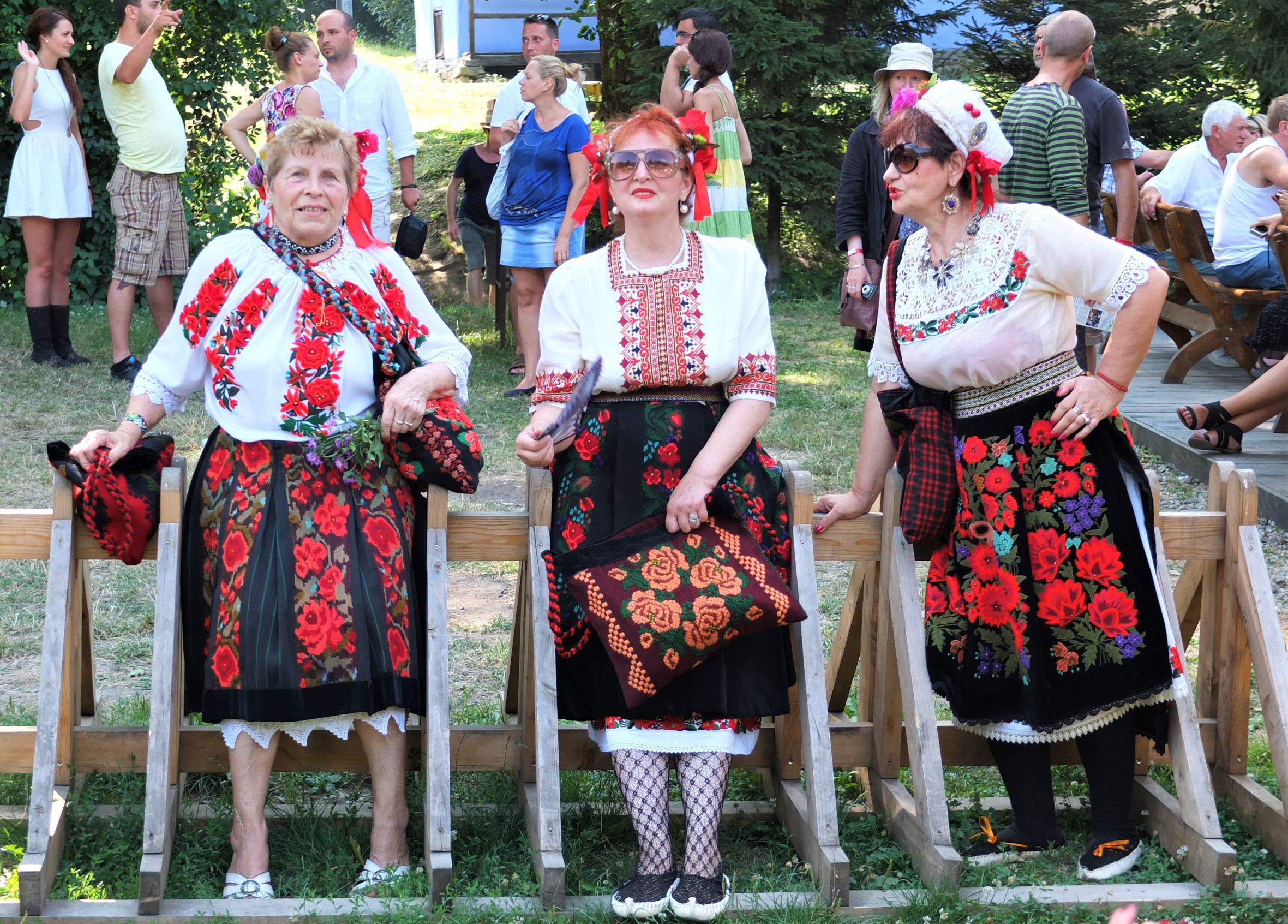 Three women in traditional Romanian costume