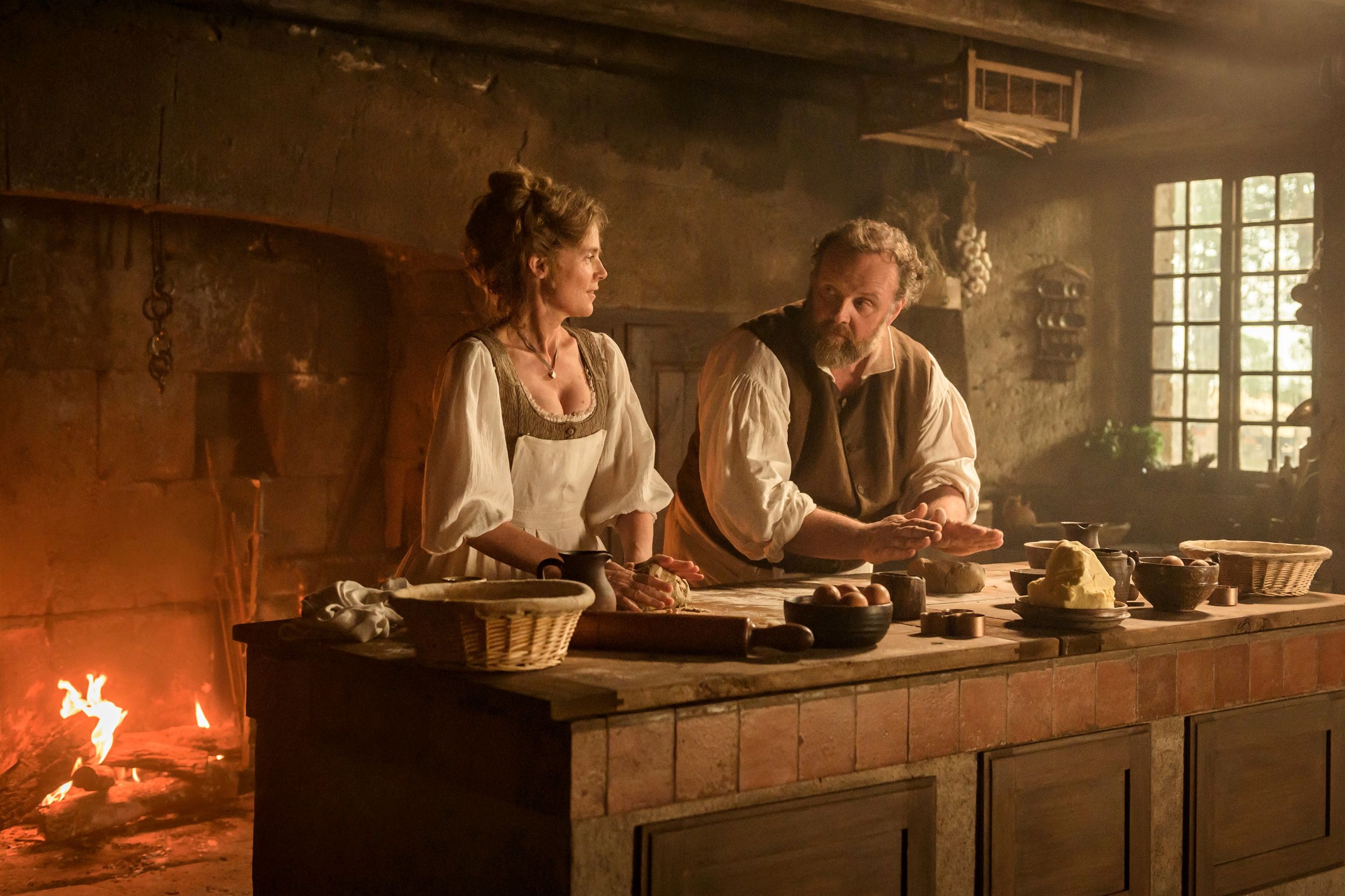 Isabelle Carré and Grégory Gadebois bake bread in the French film Delicieux